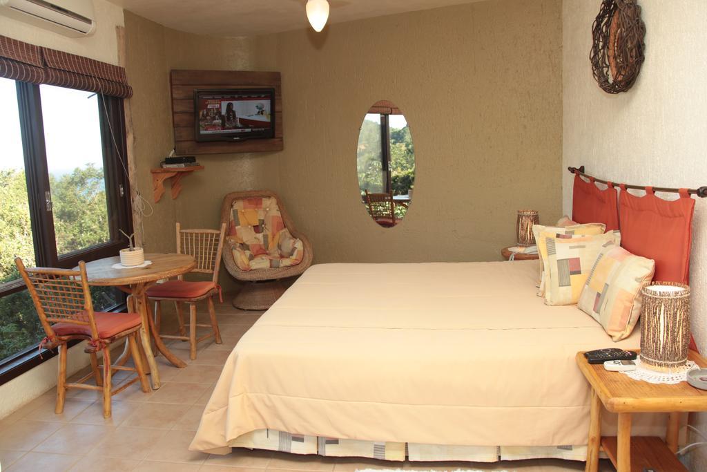 Bangalore Suites Garopaba Pokoj fotografie